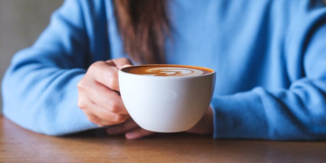 Holding a coffee mug