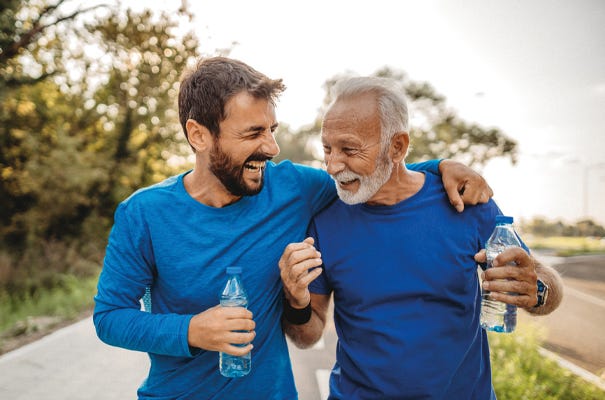 Father & Son Exercising Together Father & Son Exercising Together