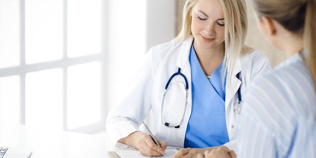 Nurse Taking Notes