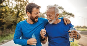 Father & Son Exercising Together Father & Son Exercising Together